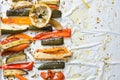 Roasted winter vegetables on aluminium foil on tray,pepper, zucchini, carrot, celery, tomato. Top view. Royalty Free Stock Photo