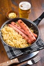 Roasted wurstel with sauerkraft and beer