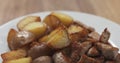 Roasted young potatoes with fried pork