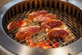 Roasting duck meat and vegetable food on Glowing and Flaming hot natural wood charcoal lump frying mesh pan in food restaurant BBQ