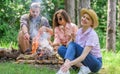 Roasting marshmallows popular group activity around bonfire. Spend great time on weekend. Company friends prepare Royalty Free Stock Photo