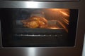 roasting chicken in the oven Royalty Free Stock Photo
