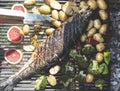 Roasting salmon fish on grill Royalty Free Stock Photo