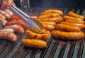 Roasting sausage outdoors Royalty Free Stock Photo