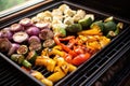 roasting vegetables on a grill for smoky salsa flavor Royalty Free Stock Photo