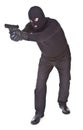 Robber aiming with his gun Royalty Free Stock Photo