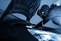 Robber Disabling Car Alarm