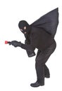 Robber with flashlight and sack