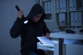 Robber With Flashlight Searching For Documents In Office Royalty Free Stock Photo