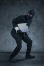 Robber stealing notebook computer Royalty Free Stock Photo