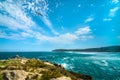 Robberg Peninsula, Robberg nature reserve landscape seabird flying up on sky. South Africa, Garden route.