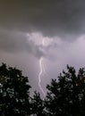 Lightning bolt on a stormy day in Kentucky  with clouds and trees Natures photography 2020 outdoors Royalty Free Stock Photo