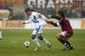 Roberto Baggio and Paolo Maldini in action during the match