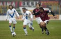 Roberto Baggio and Paolo Maldini in action during the match