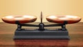 Roberval balance, scales on the wooden table. 3D rendering Royalty Free Stock Photo