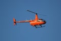 The Robinson R44 Helicopter from Cana Fly flying with tourists in Punta Cana.