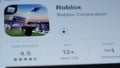 The Roblox game application is installed and downloaded to mobile devices. Roblox program symbol on the device screen. Smartphone
