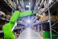 Roboric arm in warehouse