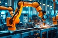 Robot arm is seen at work on welding production line in modern steel fabrication facility Royalty Free Stock Photo