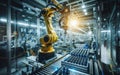 Robot Arms on Fully Automated Assembly Line Inside Modern Electronics Factory