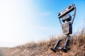 Robot on a background of blue sky Royalty Free Stock Photo