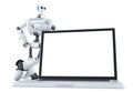 Robot with blank screen laptop. . Contains clipping path