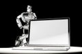 Robot with blank screen laptop. Image containc lipping path of laptop screen and entire scene Royalty Free Stock Photo