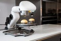 robot chef, making perfectly executed omelets in kitchen