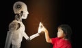 A robot and a girl\'s hands touch and connect on binary code background. Smart AI, Machine learning, and Chatbot. Artificial Royalty Free Stock Photo