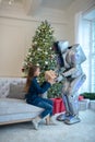 Robot giving a new year gift to the girl