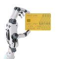 Robot hand holding credit card Royalty Free Stock Photo