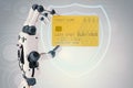Robot hand holding credit card Royalty Free Stock Photo