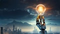 Robot hand holding light bulb Royalty Free Stock Photo