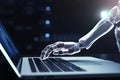 Robot hand laptop. Generate Ai Royalty Free Stock Photo