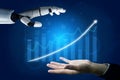 Robot Hand Reaching Toward Human Hand with Business Growth Chart in the Background Impute Royalty Free Stock Photo