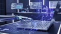 Robot Hand Typing on a Laptop Keyboard with Futuristic Digital Interfaces and Data Visualizations Royalty Free Stock Photo