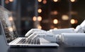 Robot hands typing laptop. Concept of future technology, machine learning or automation Royalty Free Stock Photo