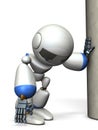 A robot that is hanging on a pillar. He is exhausted. Royalty Free Stock Photo