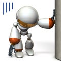 A robot that is hanging on a pillar. He is exhausted. Royalty Free Stock Photo