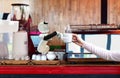 Robot hold hot coffee drinks to people work instead of man future