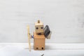 Robot holding a pen writing in diaries and talking on the phone. Royalty Free Stock Photo