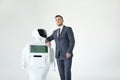 Humanoid autonomous robot with stylish man in a suit. Modern Robotic Technologies. Humanoid autonomous robot. white