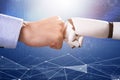 Robot And Human Hand Making Fist Bump Royalty Free Stock Photo