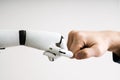 Robot And Human Hand Making Fist Bump Royalty Free Stock Photo