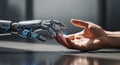 Robot and human hand reaching out to touch each other representing artificial intelligence and human connection future technology Royalty Free Stock Photo