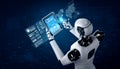 Robot humanoid using tablet computer for big data analytic Royalty Free Stock Photo