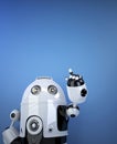 Robot pointing at invisible object. Royalty Free Stock Photo