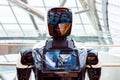 robot portrait close-up. smiling face of robot, photographer\'s reflection. Autonomous personal assistant robot