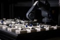 robot printing out series of parts, with each part requiring individual adjustments