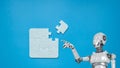 Robot and Puzzle pieces on blue background, Jigsaw puzzle with missing piece artificial intelligence, Missing jigsaw puzzle pieces Royalty Free Stock Photo